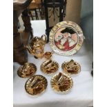 A 12 piece Wade gold coffee set & Royal Doulton 'The Mayor' Plate