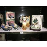 3 ceramic cats,