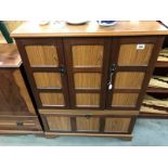 A mahogany TV cabinet