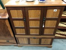 A mahogany TV cabinet