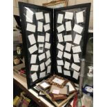 A large quantity of photo frames