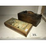 An oak cigarette box featuring crocodile figure and trinket box featuring map