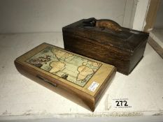 An oak cigarette box featuring crocodile figure and trinket box featuring map