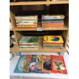 A collection approximately 56 lady bird books including well loved tales garden figures etc.