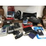 A quantity of personal stereo cassette players, calculators, etc.