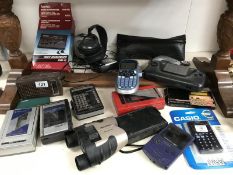 A quantity of personal stereo cassette players, calculators, etc.