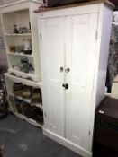 A painted pine 2 door cupboard