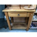 A solid oak kitchen wall unit