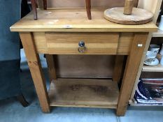 A solid oak kitchen wall unit