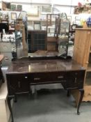 A 19830's mahogany dressing table on Queen Anne legs