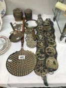 A quantity of horse brasses & milk skimmer etc.