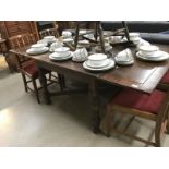 A 1930's oak draw leaf table