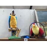 A fur real 'Squawkes McCaw' and one other model parrot.