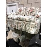 A 2 seater cottage settee and a Parker Knoll wing arm chair