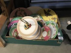 A box of assorted cabinet plates etc.