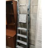 Two sets of step ladders