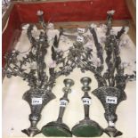 A pair of silver plate candlestick and a pair of metal pheasants