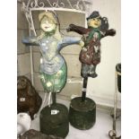 2 concrete scarecrow garden ornaments