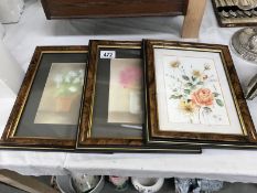 3 framed pictures of flowers