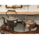 A Victorian copper kettle & 1 other