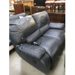 A blue electric reclining 2 seater sofa