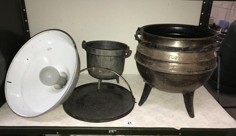 An industrial ceiling light cauldron etc.