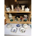 3 shelves of porcelain and glass paperweights