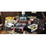 16 boxed model vehicles including Saico, Corgi, Matchbox, advertising etc.