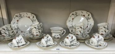 A Tudor porcelain tea set (40 pieces) sugar bowl A/F