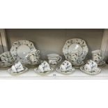 A Tudor porcelain tea set (40 pieces) sugar bowl A/F