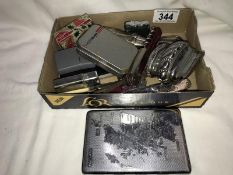 A mixed lot of vintage cigarette lighters etc.