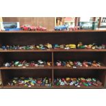 A large quantity of playworn die cast cars including Matchbox,