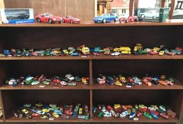 A large quantity of playworn die cast cars including Matchbox,