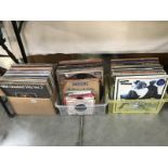 A quantity of LP records & 45 rpm records including Abba & Tina Turner etc.