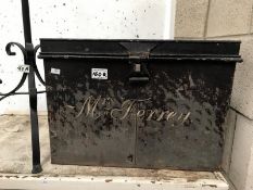 A tin trunk with name 'Mrs Ferrey'