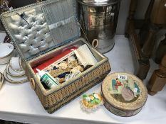 A sewing Basket and contents, a button box and a pin cushion.