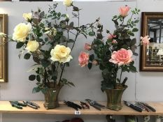 Two pots of artificial roses and a quantity of secateurs.