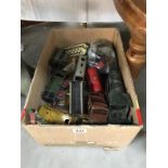 A quantity of Hornby '0' gauge clockwork tin plate railway engines, rolling stock & track etc.