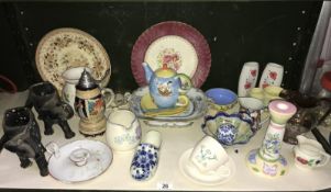 A shelf of miscellaneous pottery and porcelain