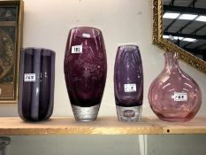 Four coloured art glass vases