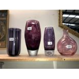 Four coloured art glass vases