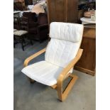 An easy chair with wooden frame