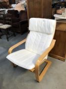 An easy chair with wooden frame