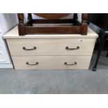 A beech effect 2 drawer chest of drawers