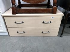 A beech effect 2 drawer chest of drawers