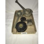 A tray of interesting items including pestle and mortar, railway ashtray, old tape measure etc.