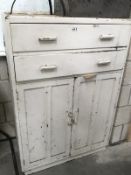 A painted pine cabinet with 2 top drawers