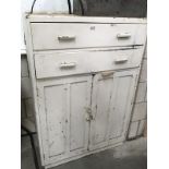 A painted pine cabinet with 2 top drawers