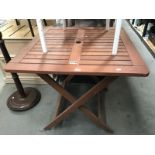 A square garden table