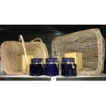 A set of London pottery storage jars and a vintage wicker basket